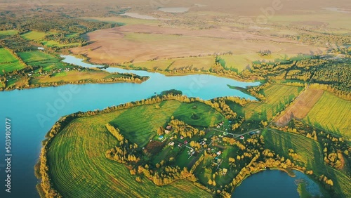 4K Aerial View Of Village Houses Near Lakes And Countryside Landscape. Lepel Lake. Lyepyel District, Vitebsk Region, Belarus. photo