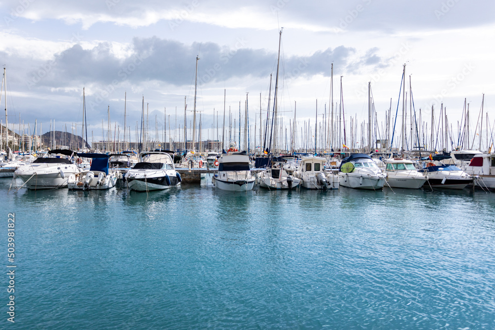 Dock with boats and yachts in the port of Alicante. 