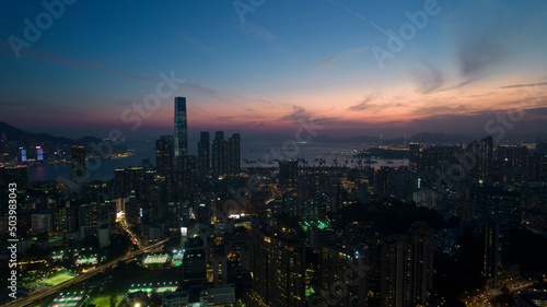 cityscape of Kowloon in Hong Kong  with the after glow of sky on the horizon of land