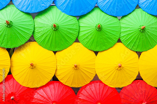 Chiangmai - THAILAND , December 1,2021 : Colorful handmade umbrellas at Chiangmai ,lanna style. © wanatithan