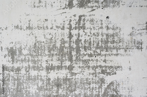 concrete wall covered with a thin layer of putty