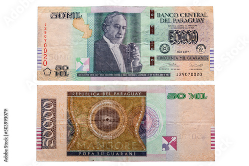 Fifty thousand Guarani note front and back isolated on white background. Guarani is the national currency of Paraguay.