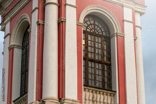 The frame window of the Christian church tower with columns. The Venetian window.