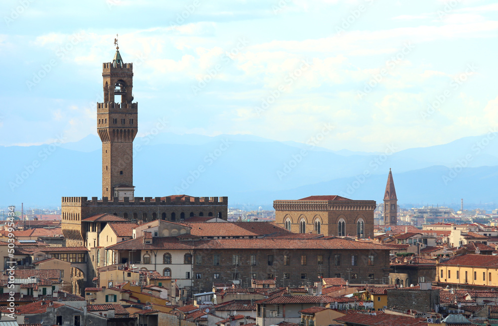 Old Palace in Florence City in Italy and the Tower called TORRE Arnolfo di Cambio and rooftops