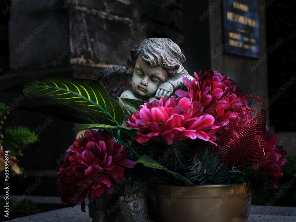 Karner cemetery graven angel detail, Bad DeutschAltenburg, Austria