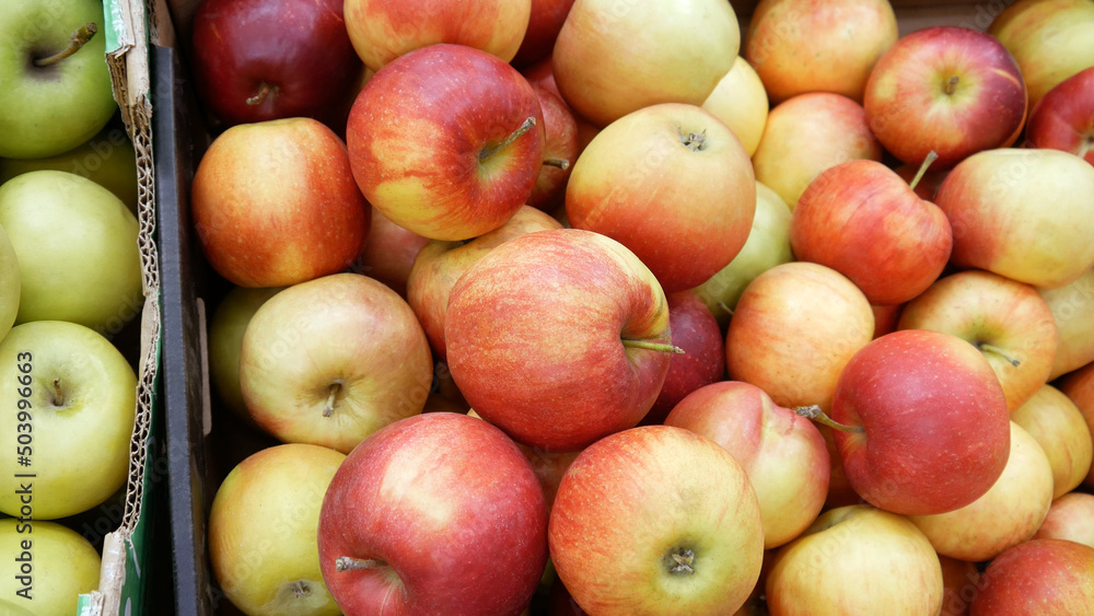Close-up of many beautiful apples in trading boxes Close-up of many beautiful apples in trading boxes