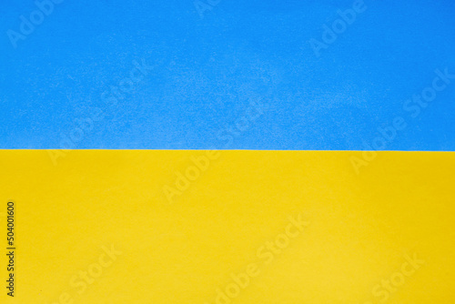 paper ukrainian flag background. Blue and yellow color