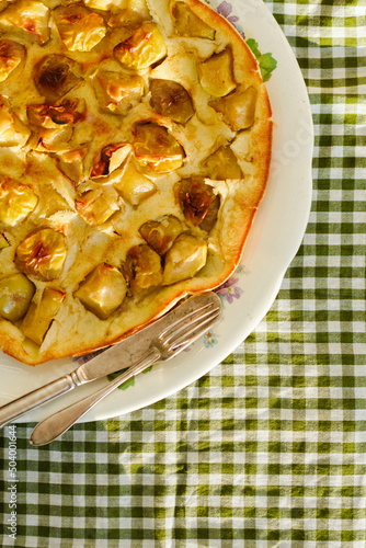 Traditional homemade apple pie. Dutch baby pancake. Top view photo