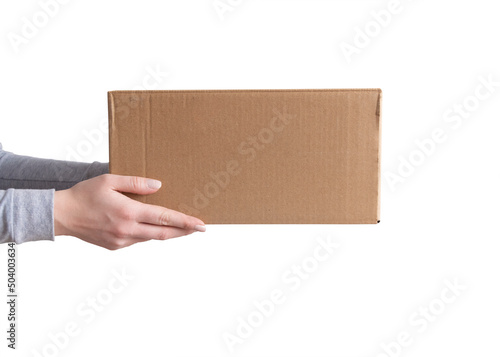 Delivery cardboard boxes in woman hand isolated © Inna