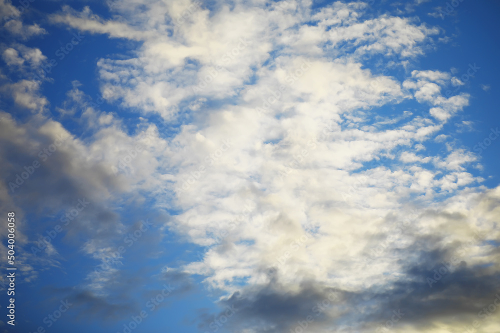 High clouds in the summer sky. Sky background. Meteorological observations of the sky.