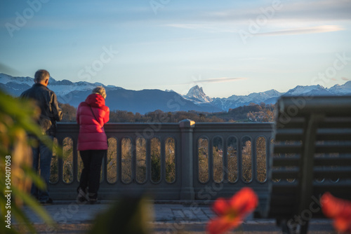People enjoying sunset from the Boulevard des Pyrénées in Pau, France
