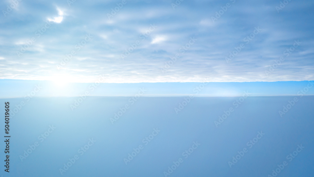 Fototapeta premium View of the sky above the clouds, beautiful sky background. photo between clouds with a small gap of blue sky
