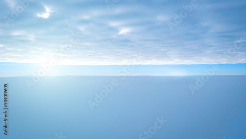 View of the sky above the clouds, beautiful sky background. photo between clouds with a small gap of blue sky