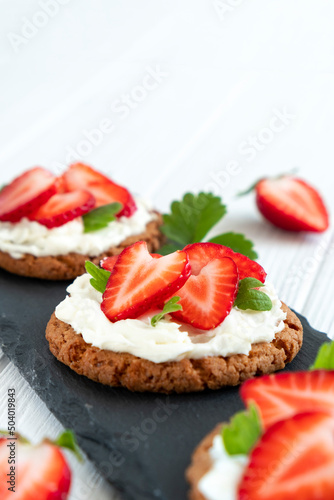 Strawberry tart with whipped cream. Recipe of fast berry cake for breakfast or holiday. Summer dessert.