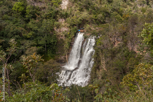 View of the Waterfall Veu de Noiva a popular fall for rappelling along the trail in Indaia near Formosa, Goias, Brazil