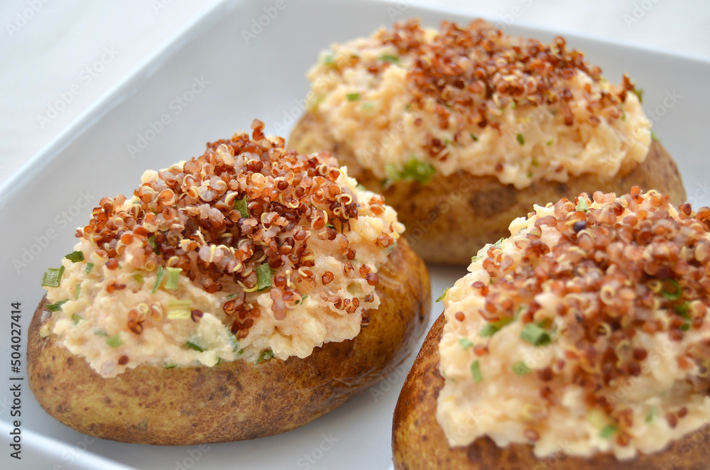 Loaded Healthy Baked Potato. With skin on, cheese, chives, and quinoa.
