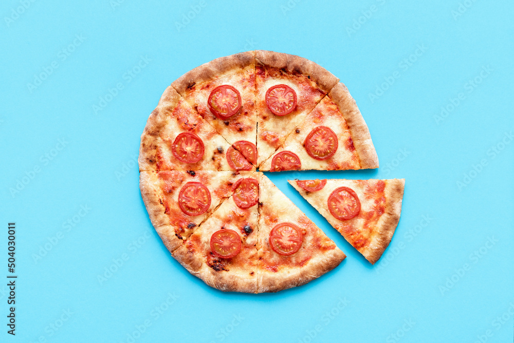 Homemade pizza top view on a blue background. Homemade pizza top view on a blue background.