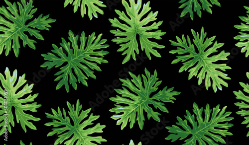 Vintage seamless pattern with tropical leaves. Exotic plants in realistic style. Foliage design on a black background. Vector botanical illustration. 