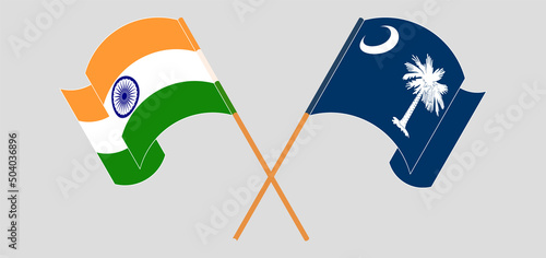 Crossed and waving flags of India and The State of South Carolina