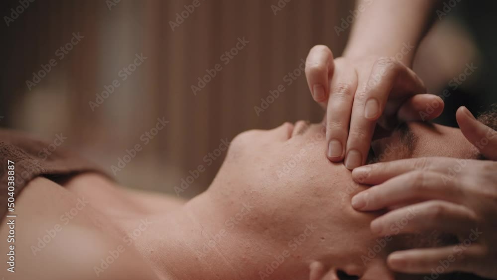 acupressure for healing headaches and other diseases, manual therapist is massaging acupuncture points acupressure for healing headaches and other diseases, manual therapist is massaging acupuncture points
