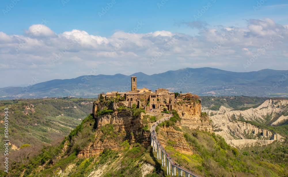 Fototapeta premium Panoramic aerial view of Civita di Bagnoregio with a view of the Calanchi Valley, Lazio, Bagnoregio, province of Viterbo.The most beautiful villages in Italy.The dying city