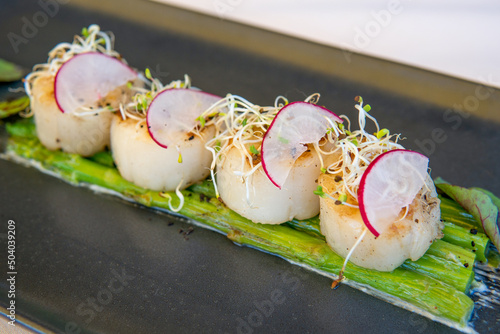 фотографія Salmon Scallop with asparagine grill