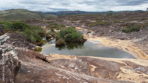 water puddle due to drought of the slab waterfall in Milho Verde, Minas Gerais located in Brazil