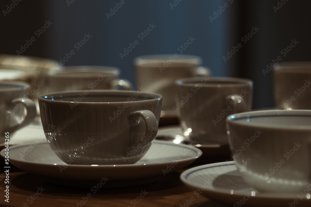 cup of coffee on a table cup of coffee on a table