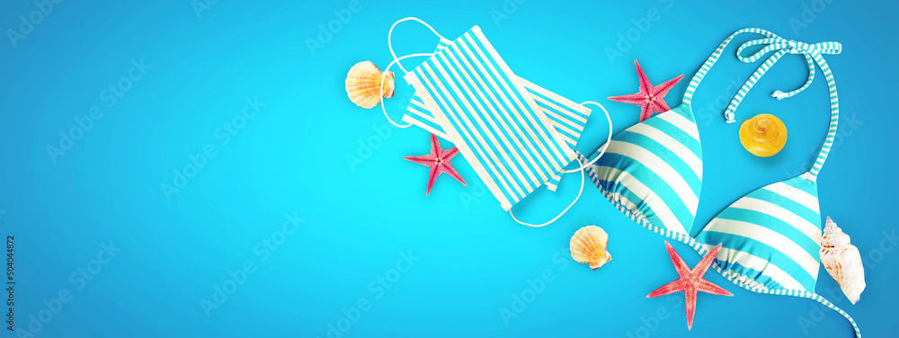 Striped bikini and corona virus mask on vacation Striped bikini and corona virus mask on vacation