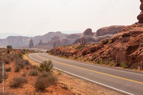 Road among geological formations in the Arches National Park, Utah, USA Fototapet