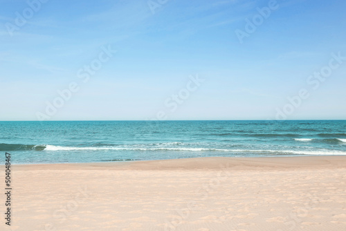 Picturesque view of beautiful sea and sandy beach on sunny day © New Africa