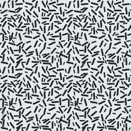 Black microbes. Shapeless and oblong bacteria are scattered on a white canvas.