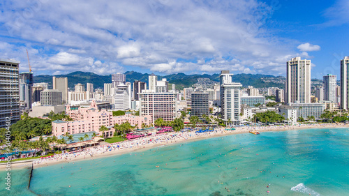 Aerial view world famous Waikiki Beach lined with oceanfront hotels and resorts in Honolulu on Oahu, Hawaii
