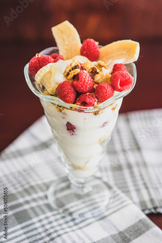 Raspberry and banana yogurt with maple sirop photo
