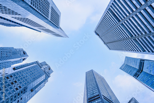 highrise building and skyscrapers in central business district © Mongkolchon