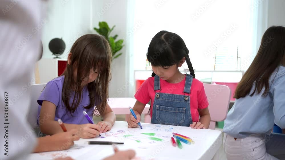 Little children in enjoy drawing and painting. Little children in enjoy drawing and painting.