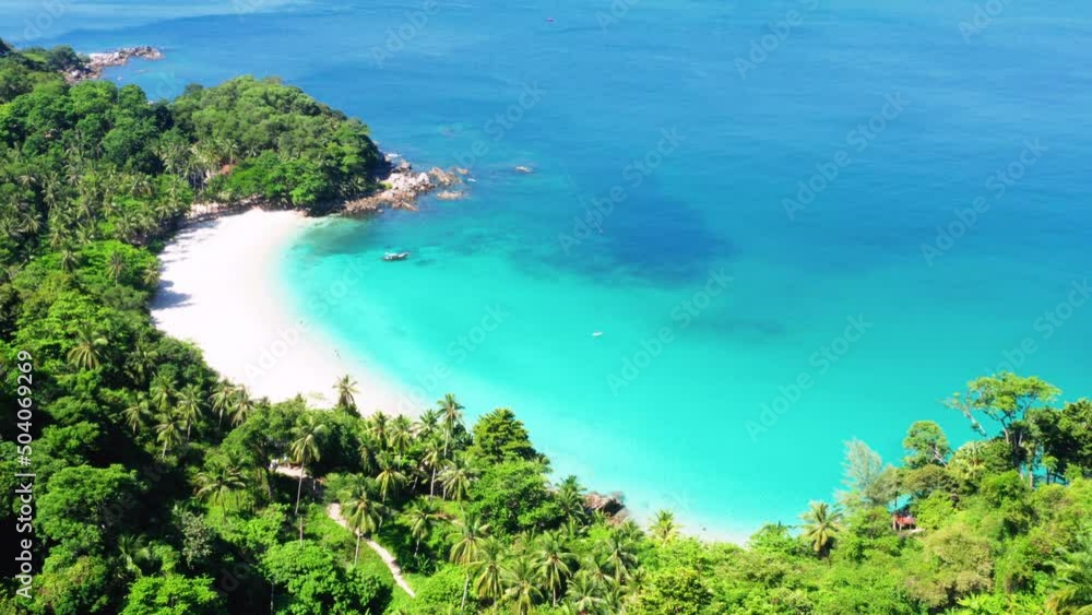 Aerial drone top down view of beautiful beach blue sea. Beach with coconut palm tree. Aerial view drone white beach sand. Blue sea clear water. Freedom Beach, Phuket, Thailand. Aerial drone top down view of beautiful beach blue sea. Beach with coconut palm tree. Aerial view drone white beach sand. Blue sea clear water. Freedom Beach, Phuket, Thailand.