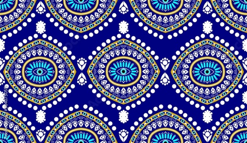 evil eye vector seamless pattern. Ethnic evil eyes geometric pattern seamless design for cloth, scarf, wallpaper, printed, carpet, wrapping, Batik, fabric, Vector illustration. Vector seamless. photo