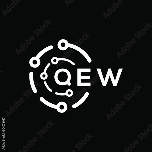 QEW technology letter logo design on black  background. QEW creative initials technology letter logo concept. QEW technology letter design. photo