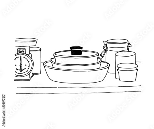 食器棚のフライパンのイラスト　シンプルな線画イラスト　台所