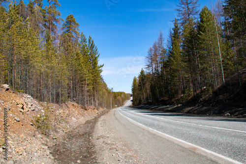 Highway in the Urals. A highway in the Urals in the Sverdlovsk region, running through forests.