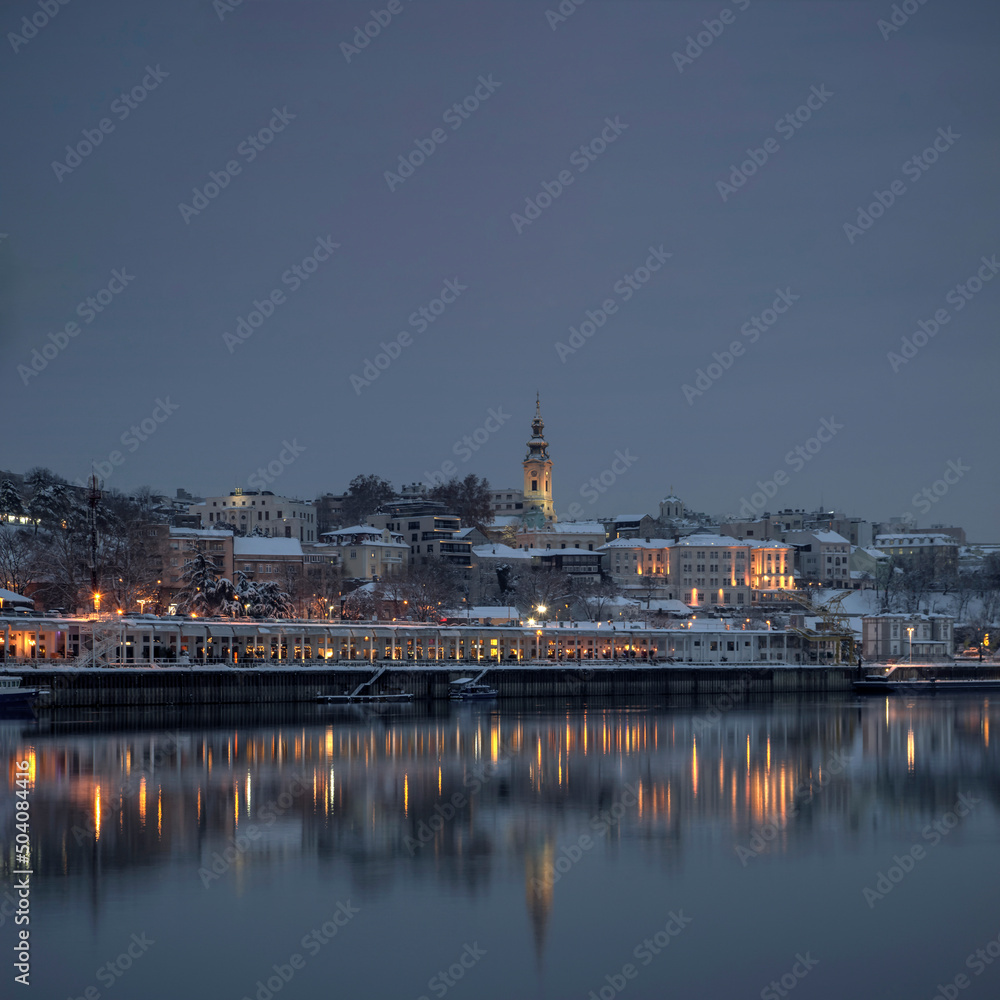 Belgrade, Serbia - View of Sava River and coastal part of the city at winter twilight