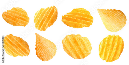 Flying tasty potato chips on white background