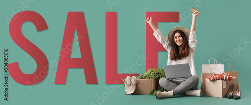 Happy young Asian woman wit...