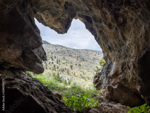 cave with mountain view and nature view