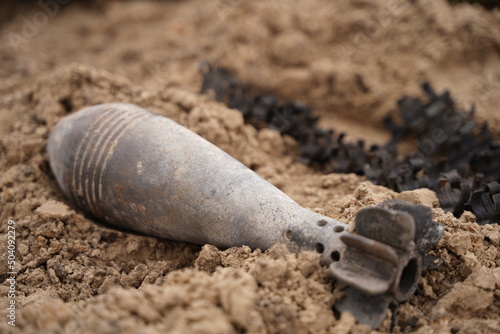 Demining by troops of the territory. Many mines, shells, artillery, grenades, fragmentation grenades. photo