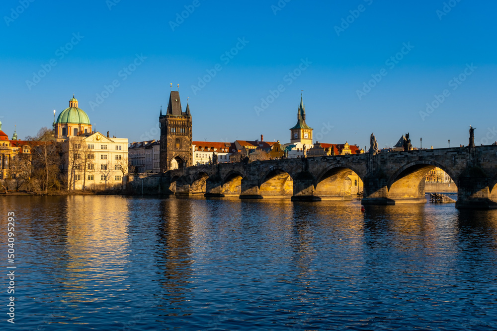 Lesser Bridge Tower and a Charles Bridge in Prague ,Czech Republic .