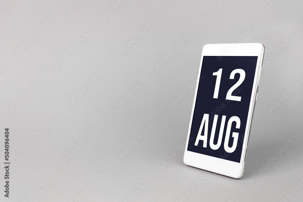 August 12nd. Day 12 of month, Calendar date. Smartphone with calendar day, calendar display on your smartphone. Summer month, day of the year concept. August 12nd. Day 12 of month, Calendar date. Smartphone with calendar day, calendar display on your smartphone. Summer month, day of the year concept.