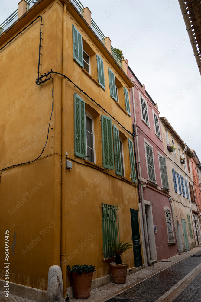 Rainy day in South of France, narrow streets and colorful buildings in Cassis, Provence, France
