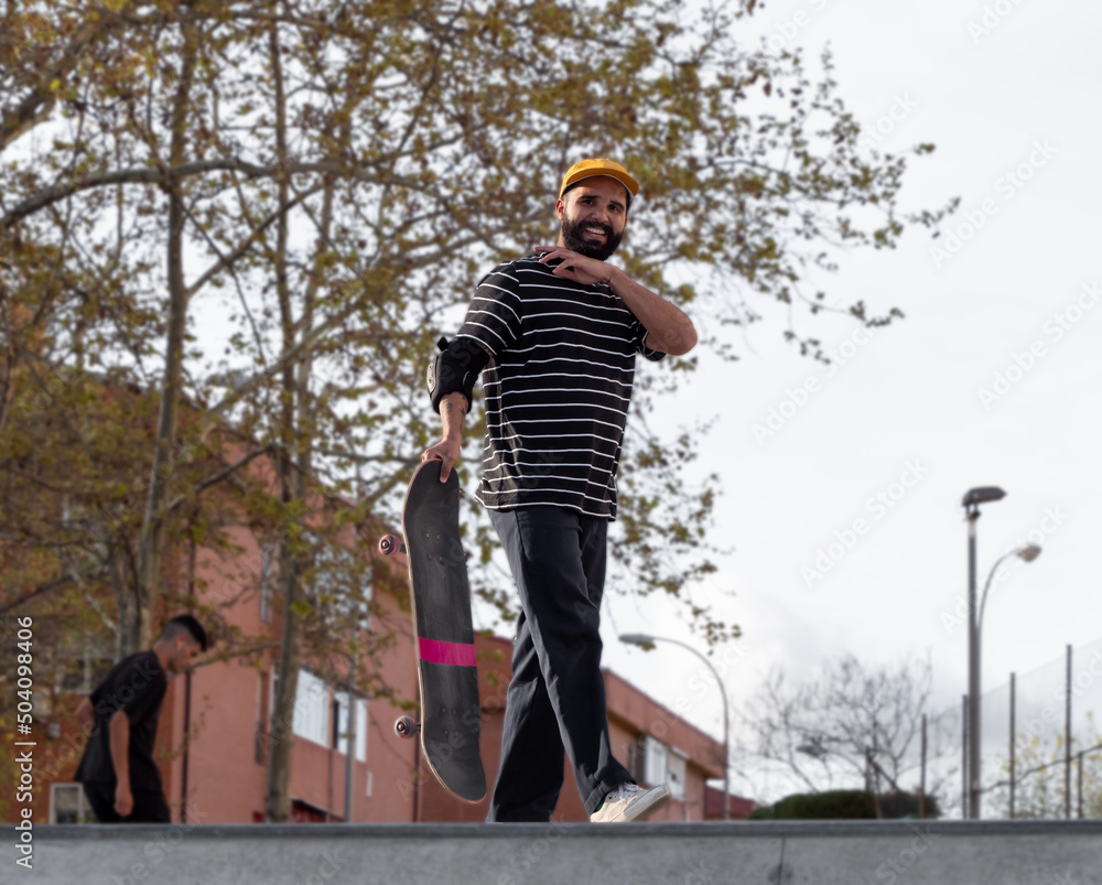 Skateboarding man embracing the skatepark vibes Skateboarding man embracing the skatepark vibes